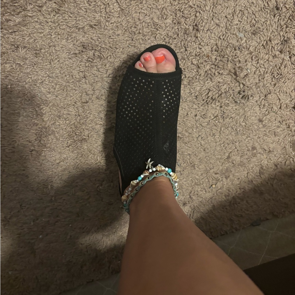 Jacklyn Smith black inch heels